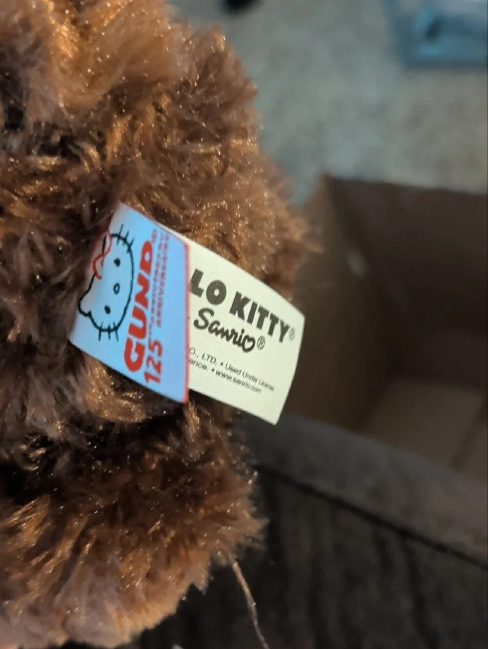 Sanrio Hello Kitty Plush in Brown with Red Bow